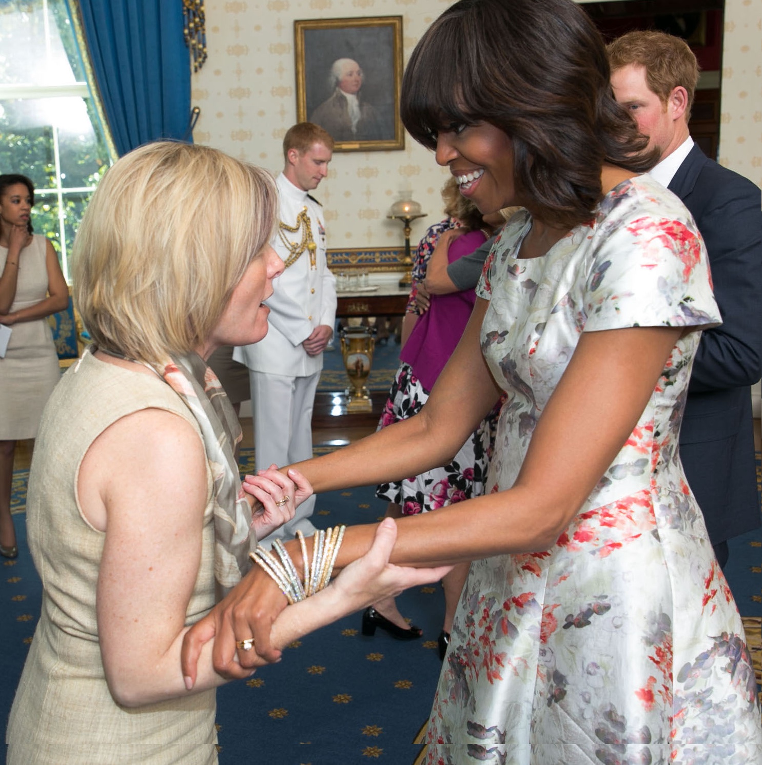 First Lady Michelle Obama, Dr. Jill Biden and Prince Harry of Wales, participate in a receiving line in the Blue Room during the Joining Forces initiative Mother's Day tea in honor of military mothers at the White House, May 9, 2013.  (Official White House Photo by Lawrence Jackson)

This photograph is provided by THE WHITE HOUSE as a courtesy and may be printed by the subject(s) in the photograph for personal use only. The photograph may not be manipulated in any way and may not otherwise be reproduced, disseminated or broadcast, without the written permission of the White House Photo Office. This photograph may not be used in any commercial or political materials, advertisements, emails, products, promotions that in any way suggests approval or endorsement of the President, the First Family, or the White House.